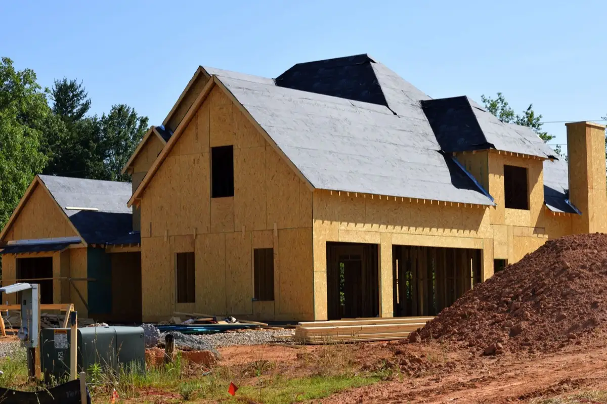 House with new roof decking and synthetic underlayment during a roof replacement in Birmingham, AL